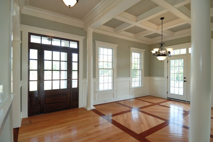 A well-designed room with new windows and entry door A well-designed room with new windows and entry door